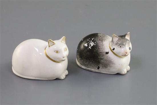 Two Derby porcelain figures of recumbent cats, c.1830, L. 6.1cm, faults to ears